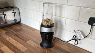 Ninja Personal Blender and Smoothie Maker QB3001 filled with nuts waiting to be blended