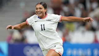 The USWNT's Sophia Smith celebrates scoring a goal against Germany in their Olympics 2024 match.