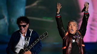 Neal Schon and Arnel Pineda onstage