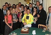 Frankie-Dettori-cutting-cake.jpg