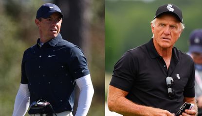 Rory and Greg Norman stare on