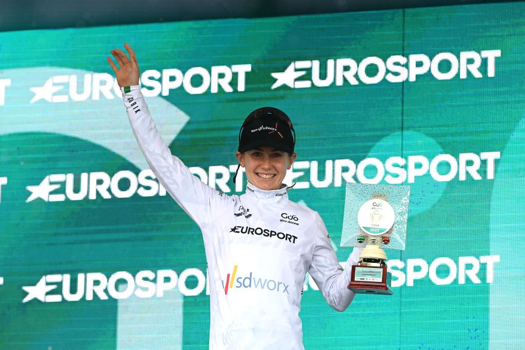 PASSO DEL MANIVA ITALY JULY 07 Niamh FisherBlack of New Zealand and Team SD Worx celebrates winning the white best young jersey on the podium ceremony after the 33rd Giro dItalia Donne 2022 Stage 7 a 1129km stage from Prevalle to Passo del Maniva 1743m GiroDonne UCIWWT on July 07 2022 in Passo del Maniva Italy Photo by Dario BelingheriGetty Images