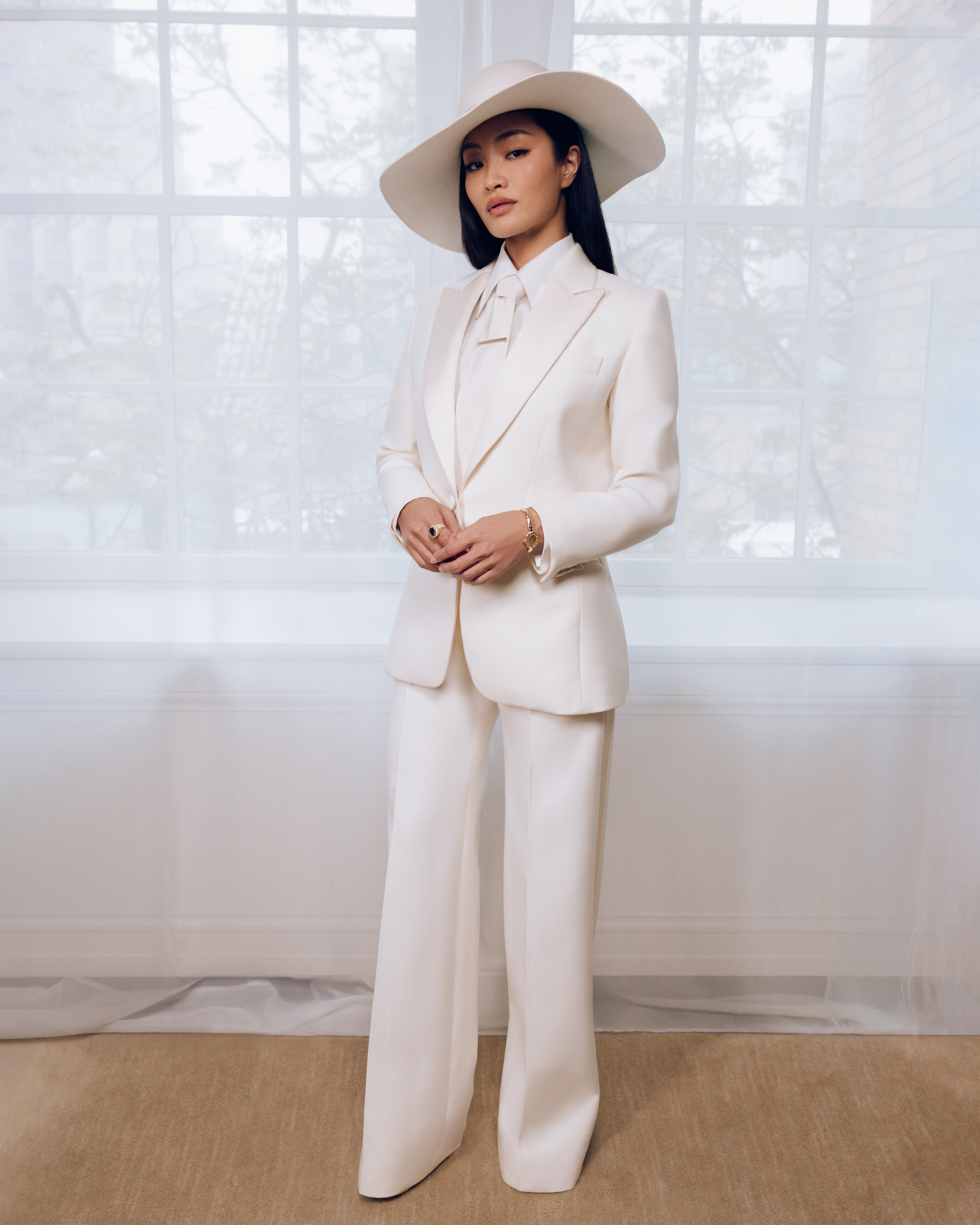 Anna Sawai getting ready for the 2025 Met Gala wearing Dior and Cartier