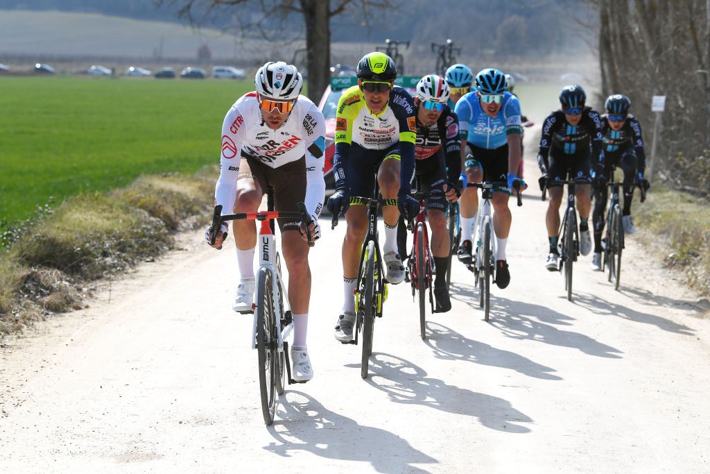 SIENA ITALY MARCH 05 LR Lilian Calmejane of France and AG2R Citren Team and Taco Van Der Hoorn of Netherlands and Team Intermarch Wanty Gobert Matriaux compete in the breakaway during the Eroica 16th Strade Bianche 2022 Mens Elite a 184km one day race from Siena to Siena Piazza del Campo 321m StradeBianche WorldTour on March 05 2022 in Siena Italy Photo by Tim de WaeleGetty Images