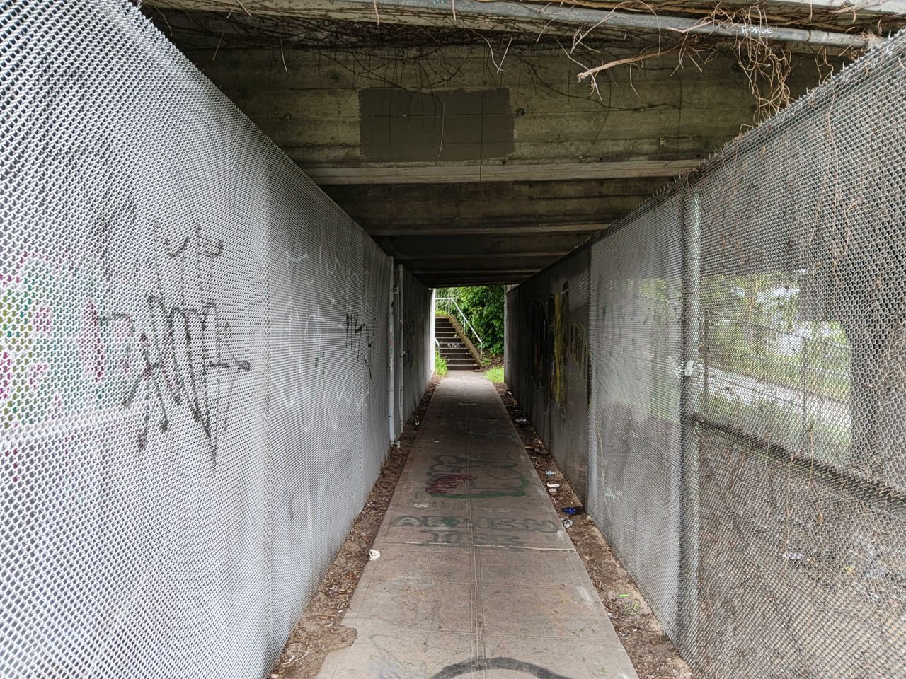 A tunnel with gates on either side