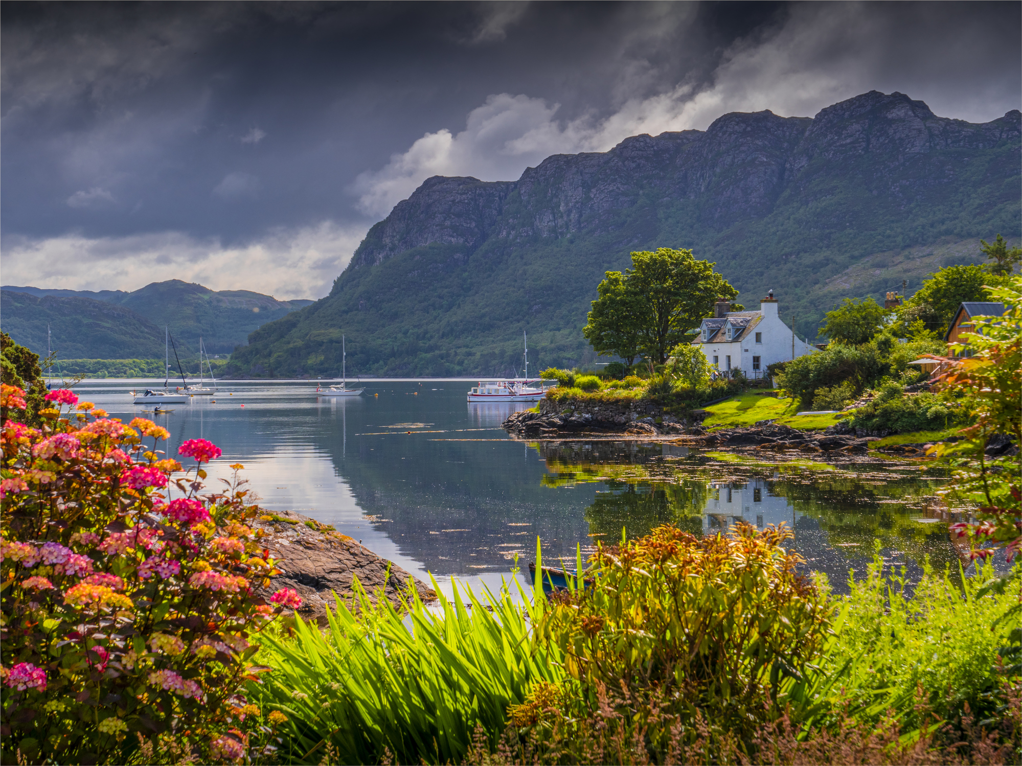 A view in the beautiful village of Plockton on the shores of Loch Carron, Western highlands, Scotland, United Kingdom.