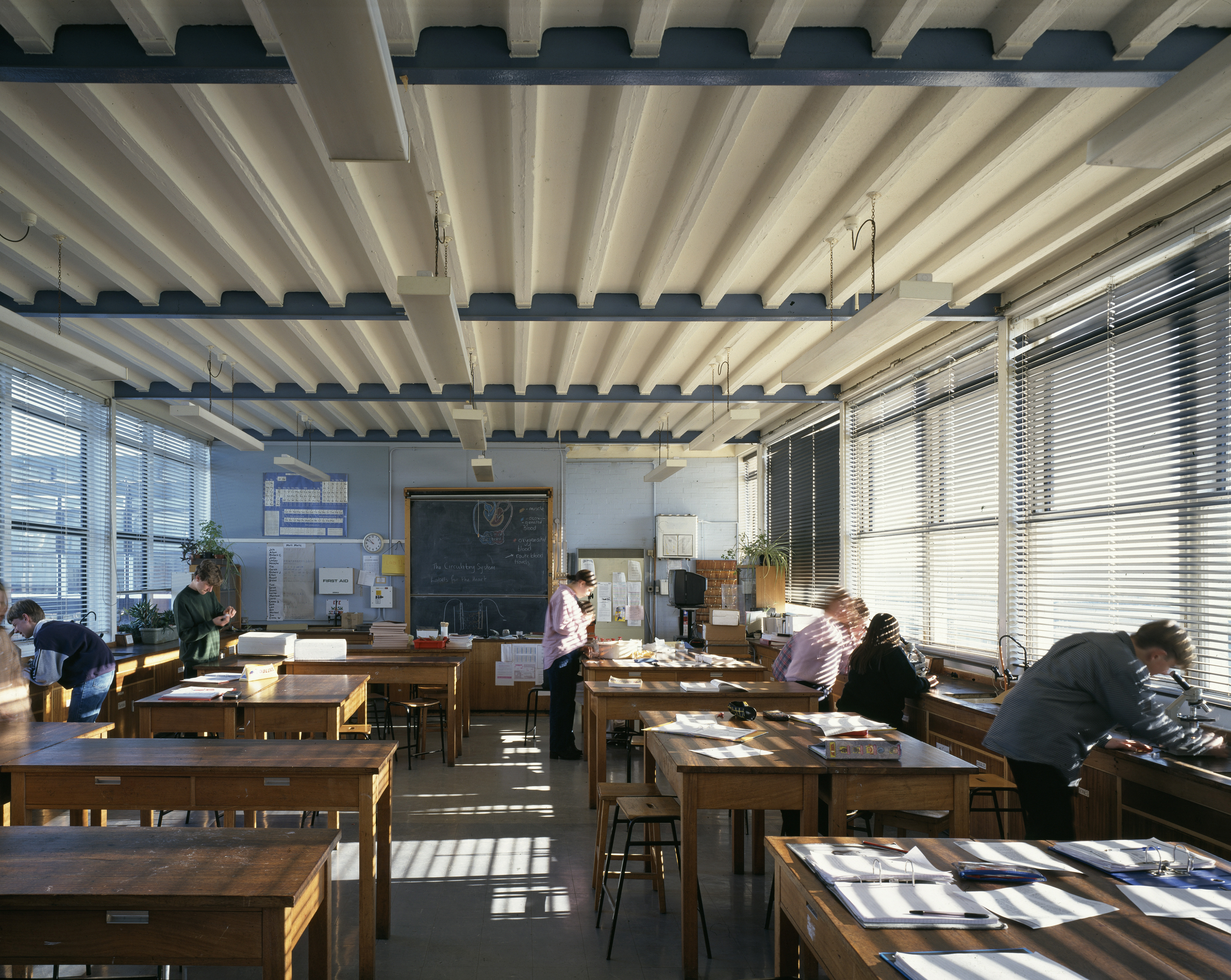 views of brutalist school on blue sky day - Hunstanton school aka Smithdon High School by alison and peter smithson