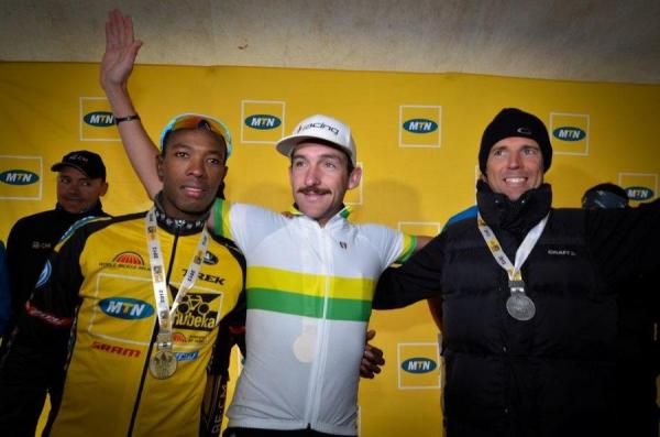 Adrien Niyonshuti, Max Knox and David George on the podium