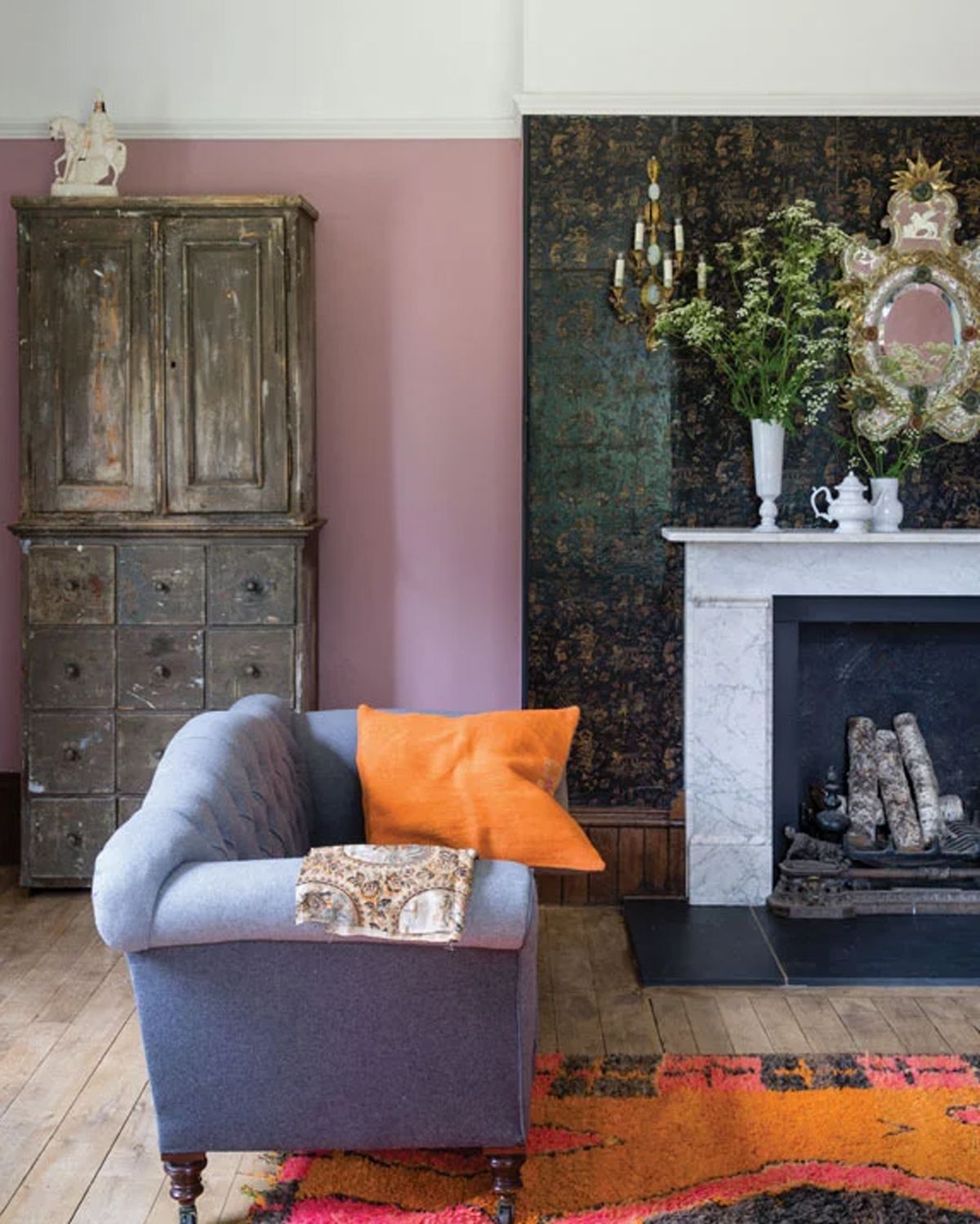 Living room with farrow and Ball Cinder Rose pink piant color on wall