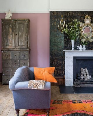 Living room with farrow and Ball Cinder Rose pink piant color on wall