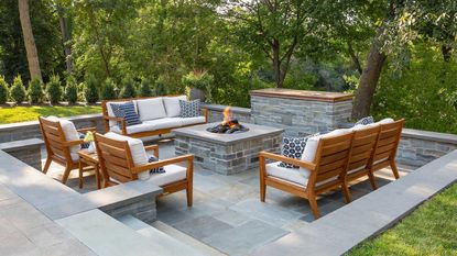 backyard ideas with sunken seating and fire pit