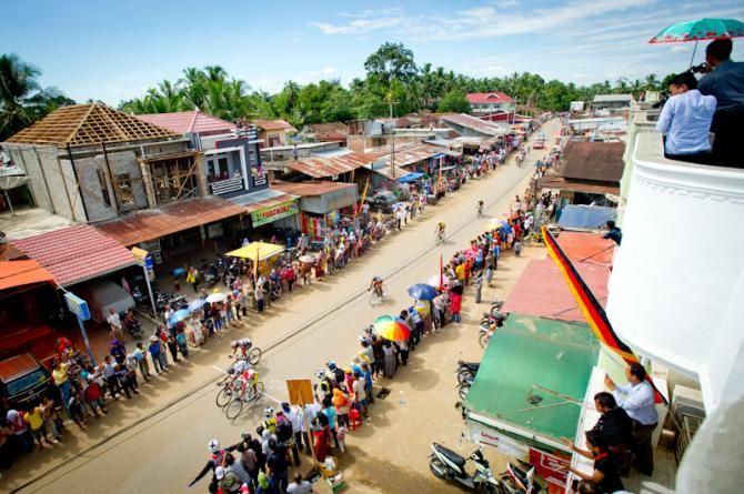 Riders passing at the intermediate sprint line in a tiny town, Koto Baru, at the Tour de Singkarak
