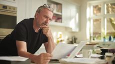 Man looking at paperwork