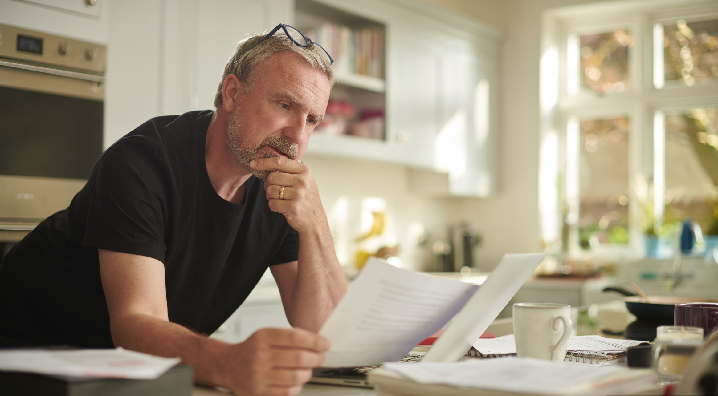 Man looking at paperwork