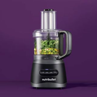 NutriBullet food processor on purple background