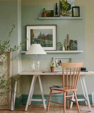 Home office with a range of soft green paint colors