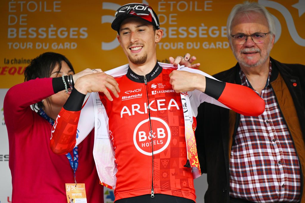 ALES FRANCE FEBRUARY 04 Kevin Vauquelin of France and Team Arkea BB Hotels celebrates at podium as as White best young jersey winner during the 54th Etoile de Besseges Tour du Gard Stage 5 a 10645 individual time trial at stage from Ales to Ales 290m on February 04 2024 in Ales France Photo by Luc ClaessenGetty Images
