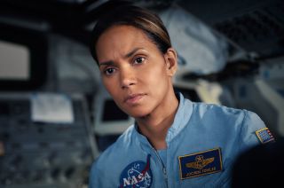Halle Berry, as NASA astronaut Jo Fowler, is seen inside the space shuttle in the Roland Emmerich film "Moonfall." More than a movie set, the scene was shot using a retired NASA simulator.