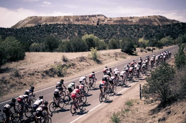 The peloton makes its way past the Santa Rita mine.