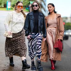 Collage of woman wearing slip skirts with boots outfits.