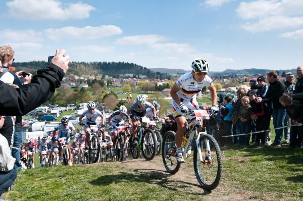 Sabine Spitz leads the women at the start
