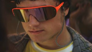 Josh Hutcherson wearing retro futuristic sunglasses in Detention.