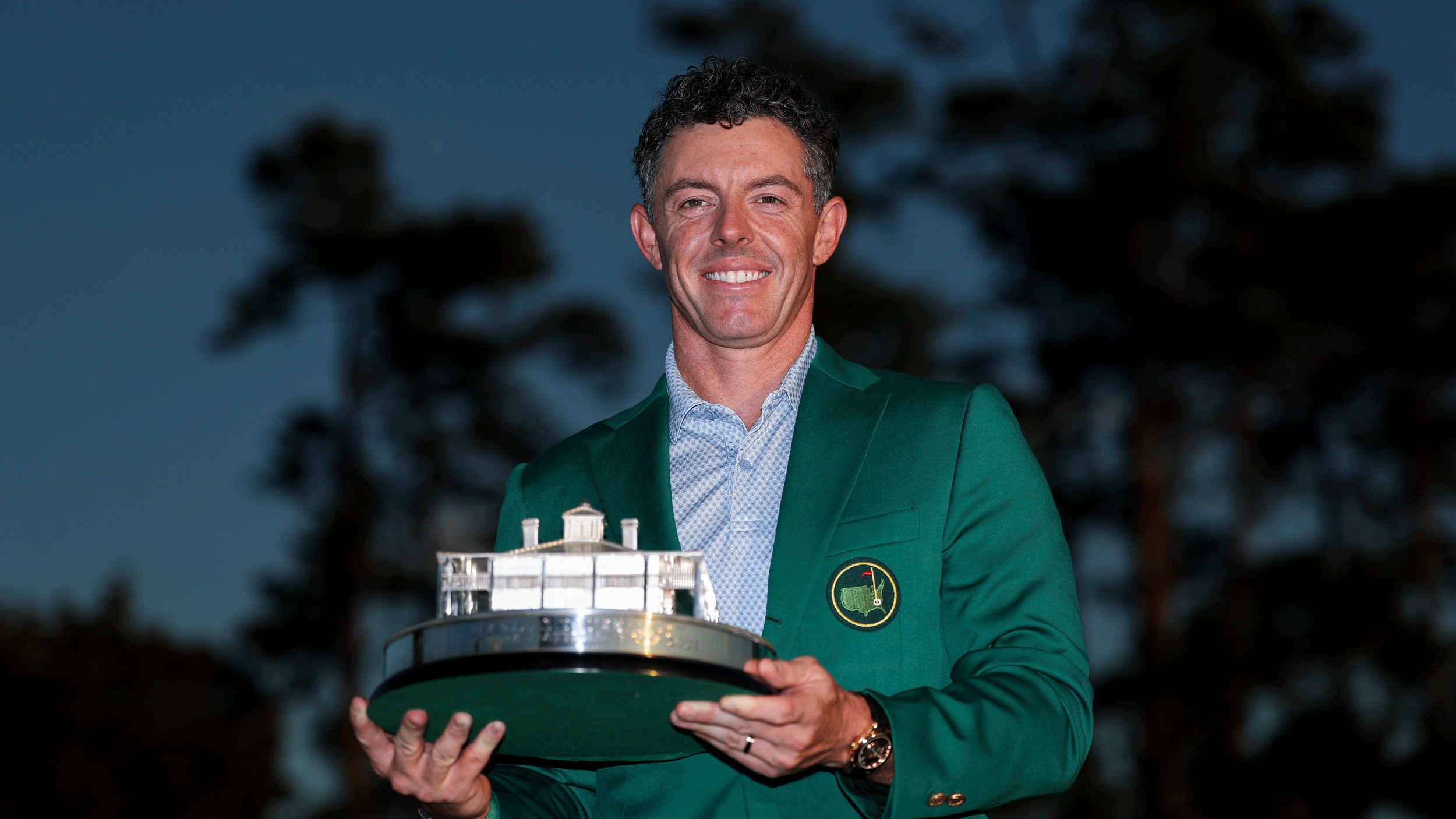 Rory McIlroy poses with The Masters trophy after winning his second Green Jacket in 2026