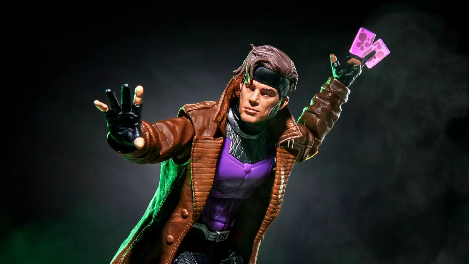 Marvel Legends Gambit Avengers: Doomsday action figure holding out a hand while readying glowing purple cards between its fingers