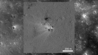 a black and white image of a impact crater on the moon