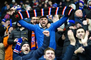 Rangers fans celebrate at Ibrox Stadium