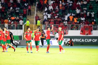 Morocco AFCON 2023 squad: Players of Morocco celebrate after scoring a goal during the Africa Cup of Nations (CAN) 2024 Group F football match between Morocco and Tanzania at Stade Laurent Pokou in San Pedro, Ivory Coast on January 17, 2024. (Photo by Stringer/Anadolu via Getty Images)