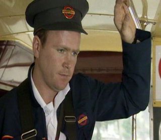 Phil Mitchell actor Steve McFadden as a bus conductor