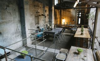 Steel platforms with tables and chairs for seating