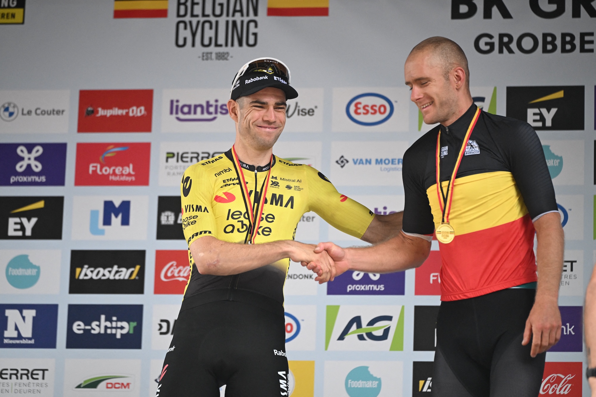 Second place Wout van Aert and winner Daan Soete pictured on the podium after the elite race at the Belgian Gravel Championships, Sunday 16 August 2026 in Grobbendonk. BELGA PHOTO ELIAS ROM (Photo by ELIAS ROM / BELGA MAG / Belga via AFP)
