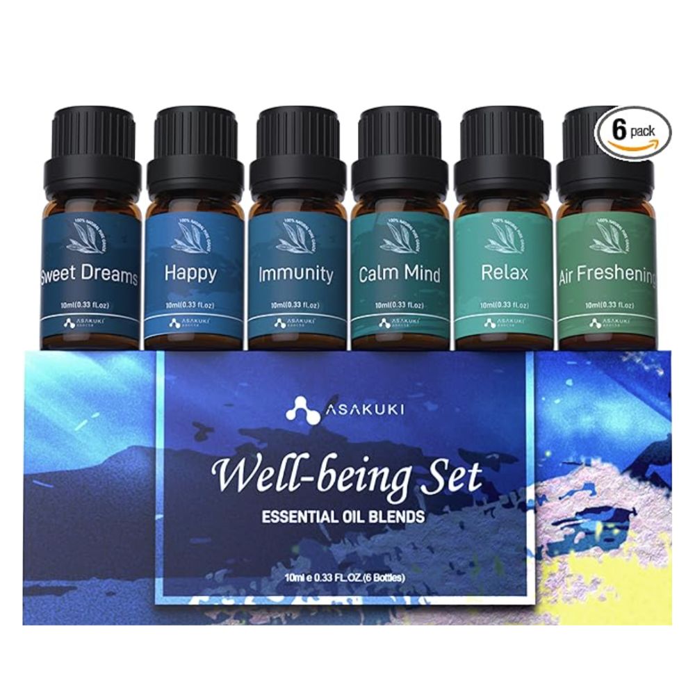 Wellbeing set of six essential oils in blue and green packaging