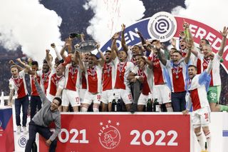 Ajax players celebrate after their Eredivisie win in 2022.