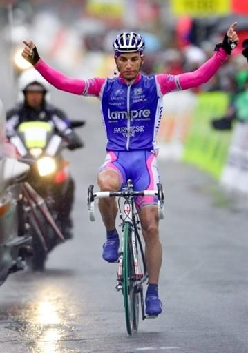 Simon Spilak (Lampre-Farnese Vini) salutes after a sodden stage in Switzerland