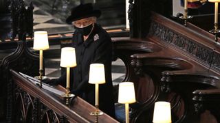 ueen Elizabeth II watches as pallbearers carry the coffin of Prince Philip, Duke Of Edinburgh into St George's Chapel