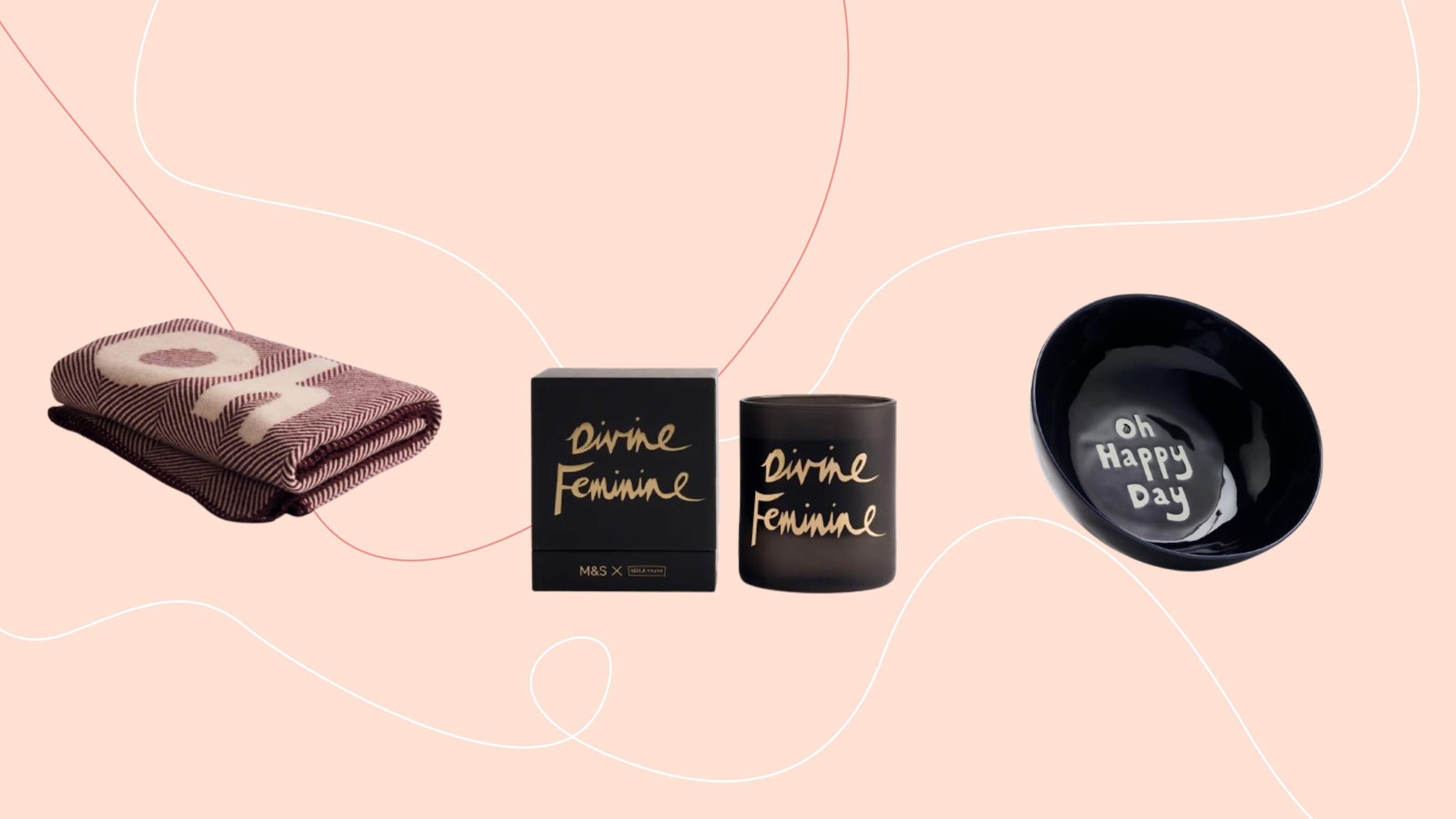 A Bella Freud x M&S candle with 'Divine Feminine' slogan, bowl with 'Oh Happy Day' and blanket with 'Oh' on pink graphic background