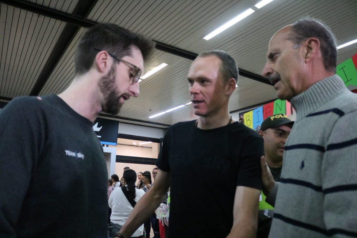 Chris Froome is greeted by the president of the Colombian Federation