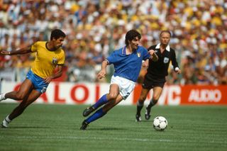 Paolo Rossi of Italy gets away from Toninho Cerezo of Brazil