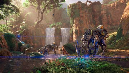 A screenshot from Horizon Zero Dawn Remastered, showing two machines in front of a waterfall.