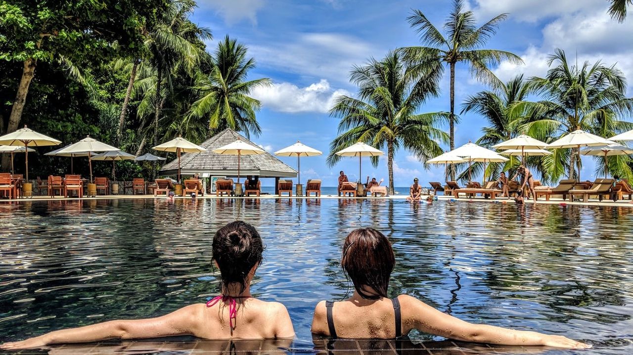 Ladies looking at pool shades