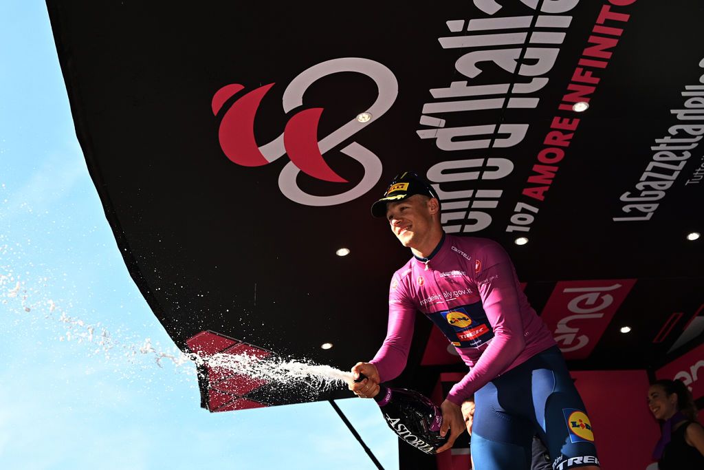 RAPOLANO TERME ITALY MAY 09 Jonathan Milan of Italy and Team Lidl Trek celebrates at podium as Purple Points Jersey winner during the 107th Giro dItalia 2024 Stage 6 a 180km stage from Viareggio to Rapolano terme 322m UCIWT on May 09 2024 in Rapolano terme Italy Photo by Tim de WaeleGetty Images