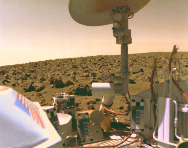 a hazy photograph of Mars with scientific equipment