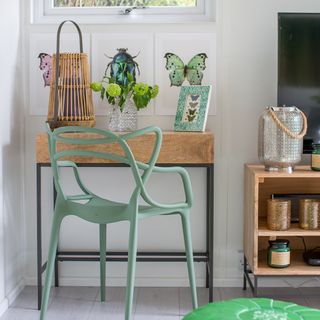 living room with wooden flooring and photoframe on white wall