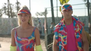 Barbie and Ken looking stressed and suspicious while rollerblading on the beach.