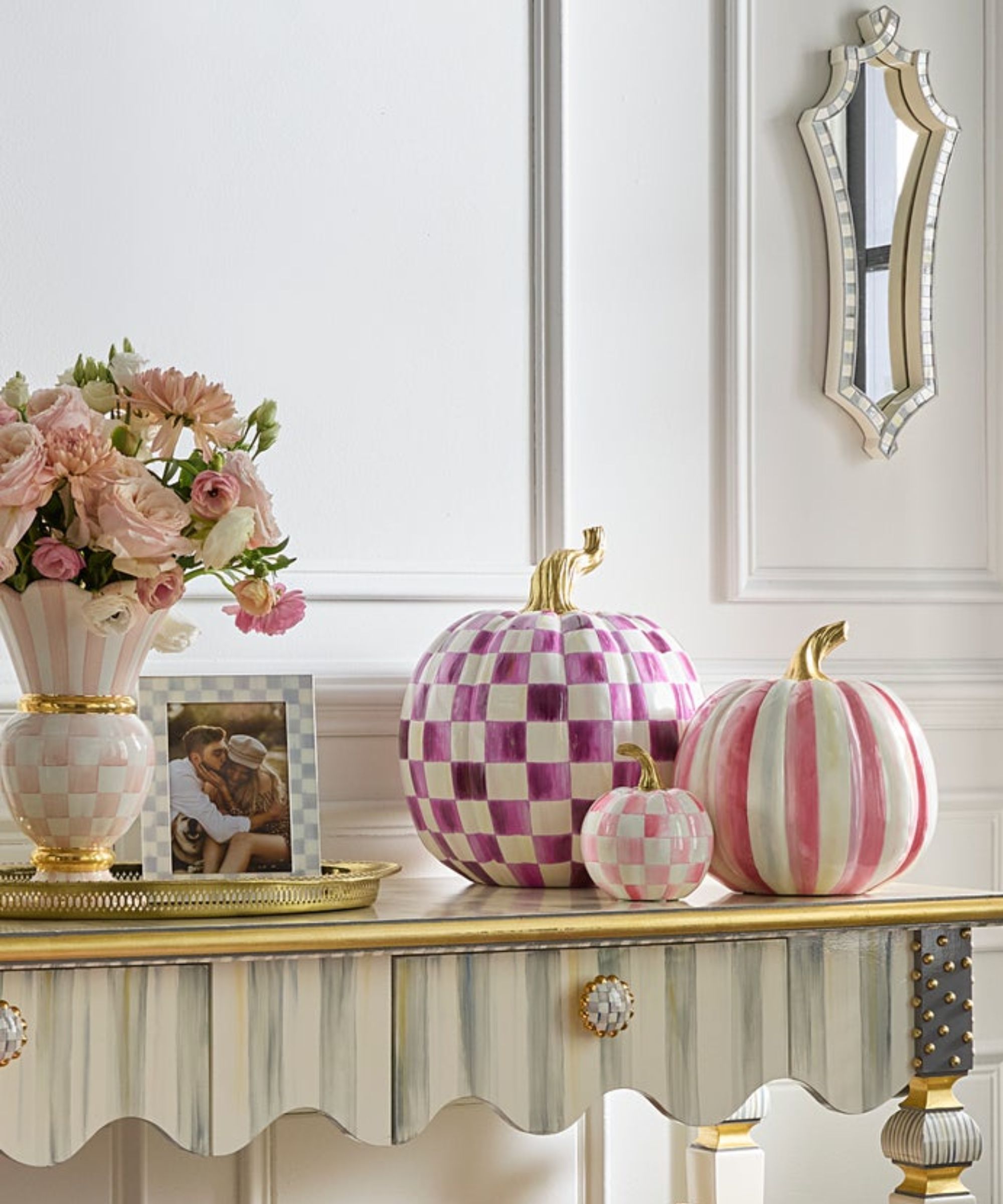 Grey and white stripe sideboard with pink and purple check resin pumpkins