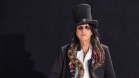 Alice Cooper in top hat with snake