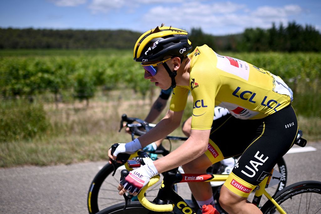 Team UAE Emirates Tadej Pogacar of Slovenia wearing the overall leaders yellow jersey rides during the 13th stage of the 108th edition of the Tour de France cycling race 219 km between Nimes and Carcassonne on July 09 2021 Photo by AnneChristine POUJOULAT AFP Photo by ANNECHRISTINE POUJOULATAFP via Getty Images